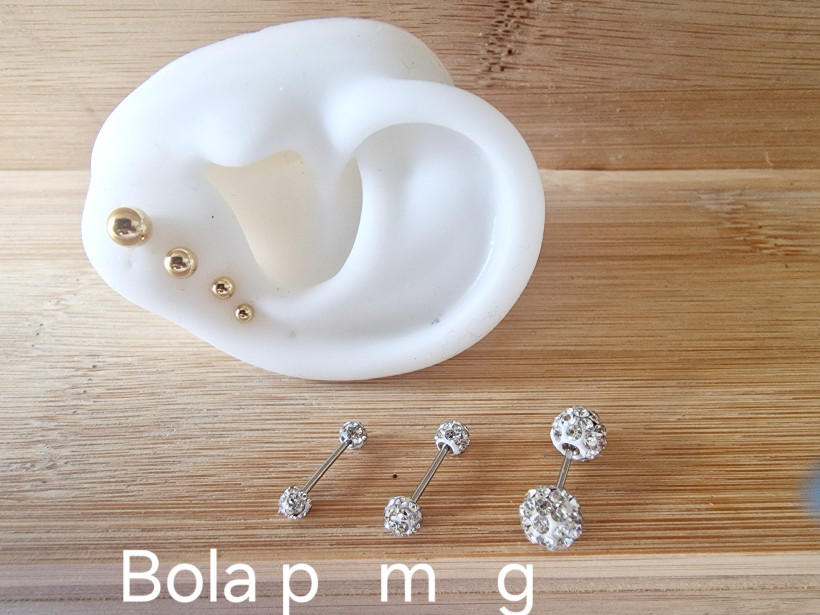 PIERCING G        "bola brilhantes 2 lados"