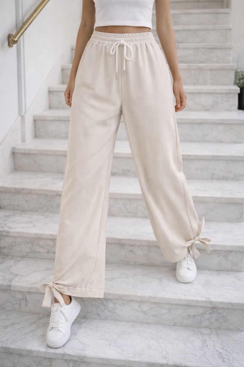 Spodnie z kokarda na kostce ecru