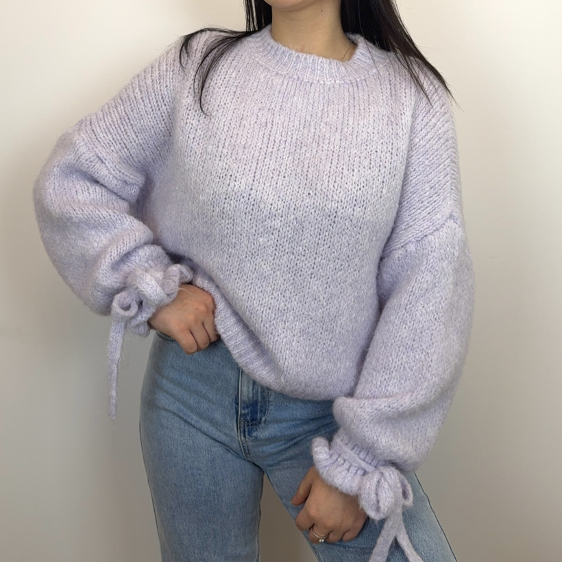 Sweter z kokardkami