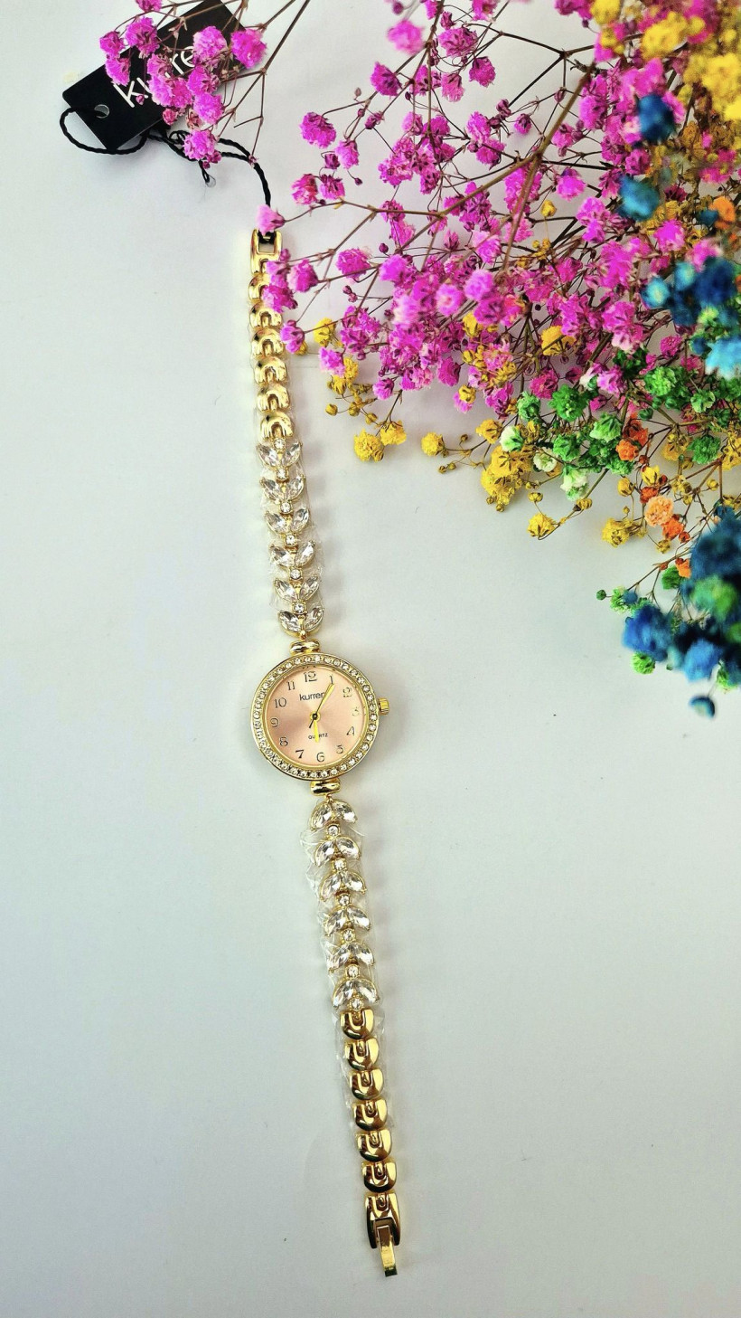 Zegarek z różową tarczą i cyrkoniami 