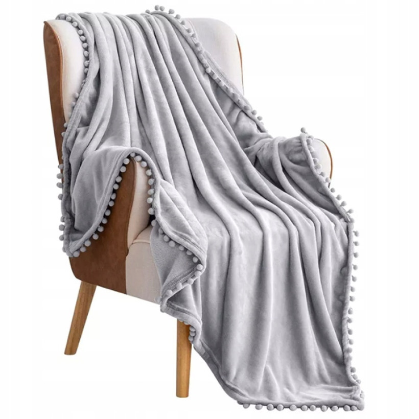 Koc boho z pomponami 130x180cm szary KKE-153