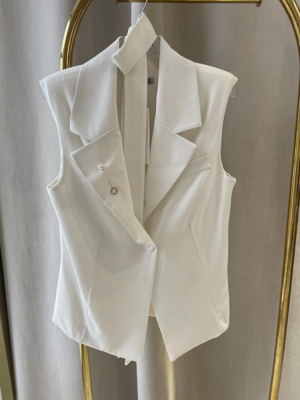 ON KAMIZELKA ŚMIETANA