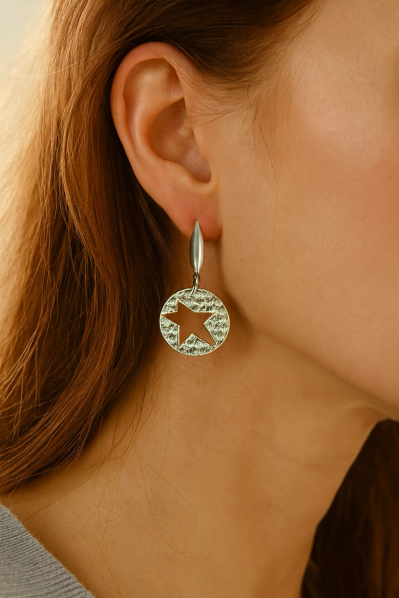 BOUCLE D'OREILLE ETOILE INSPI ACIER