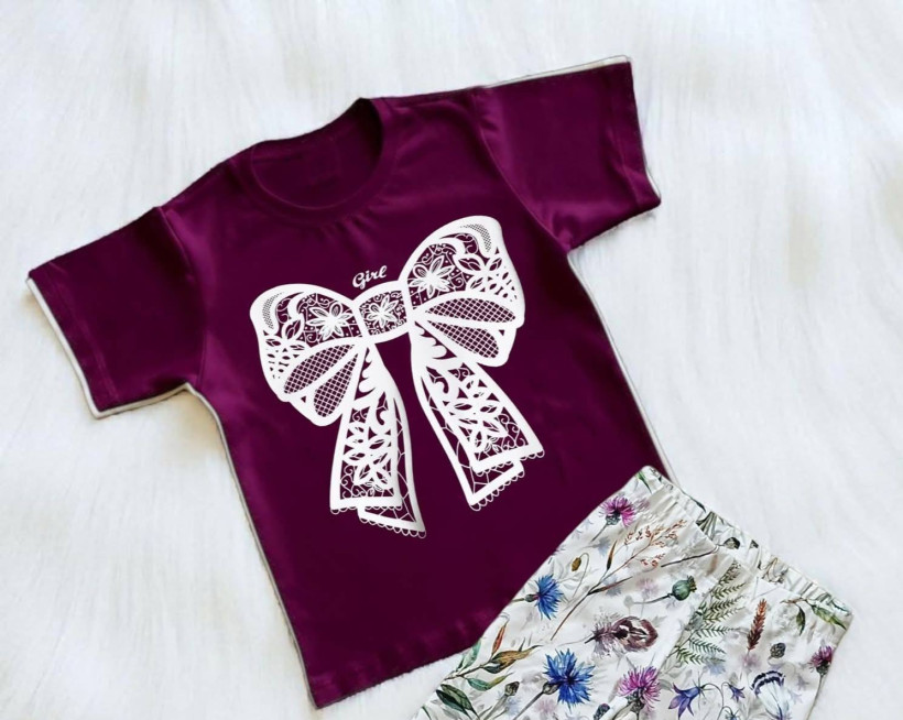 Koszulka dziewczęca Emiś z kokardą – Wygoda i styl na co dzień!