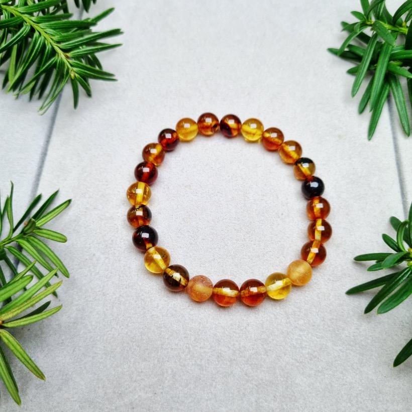 Bransoletka z naturalnego bursztynu bałtyckiego – klasyczna elegancja, ciepłe odcienie, ręcznie wykonana biżuteria