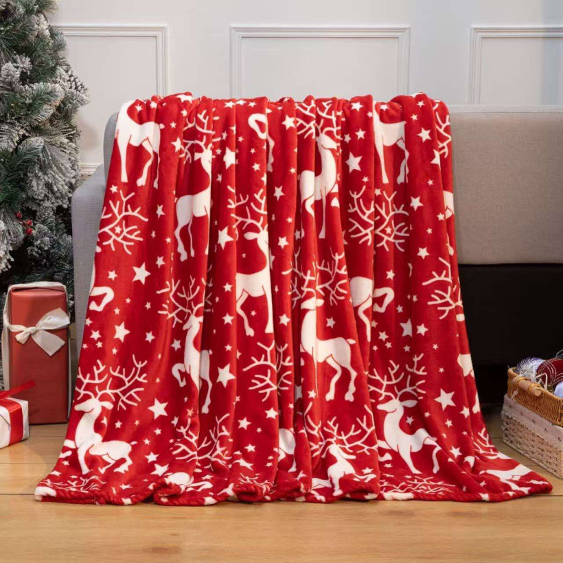 Koc narzutka z motywem świątecznym kk1410 czerwony w białe reniferki