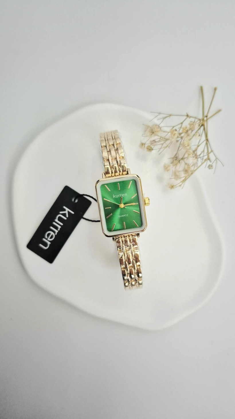 zegarek z zieloną tarczą 