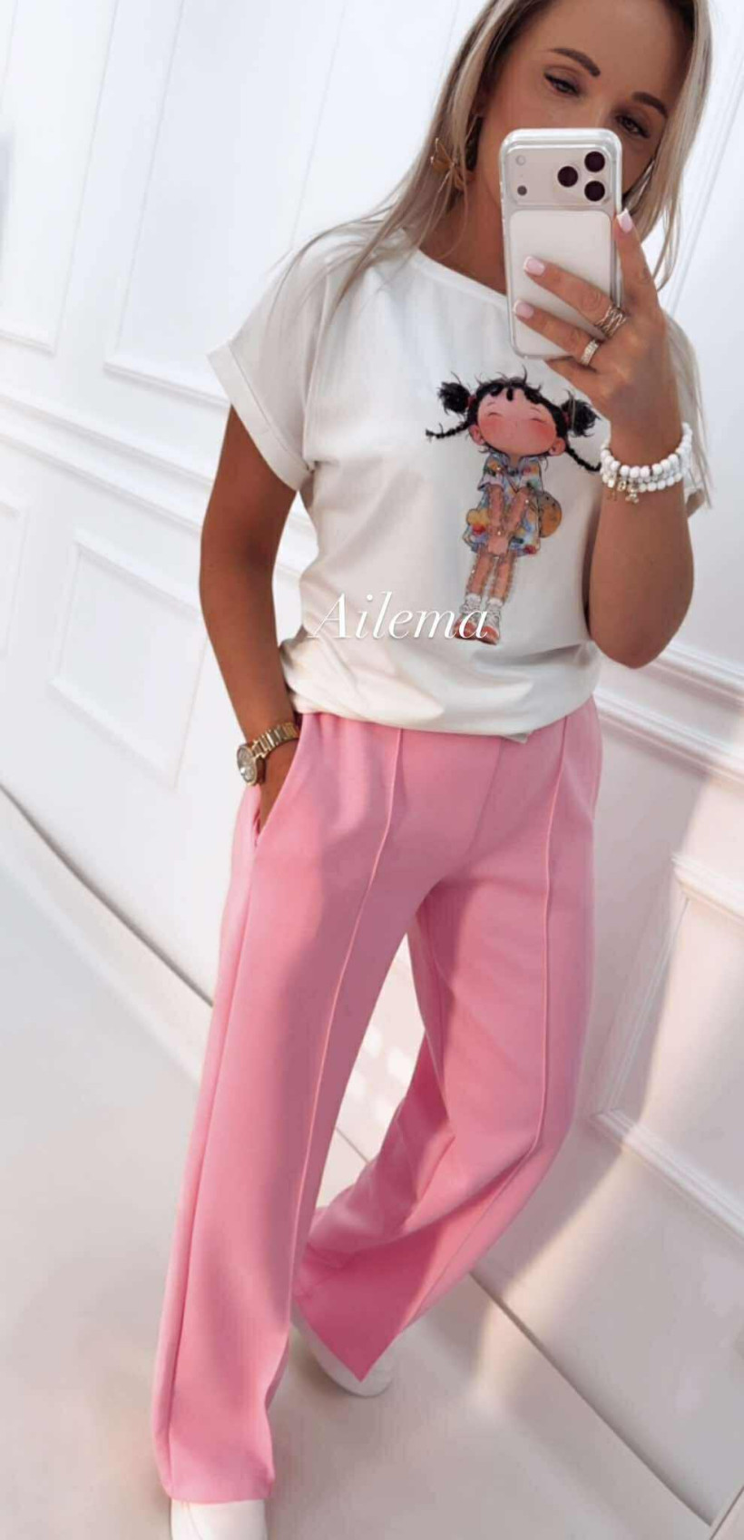 Spodnie z przeszyciem na długości 372 kremowy pasek, z gumą